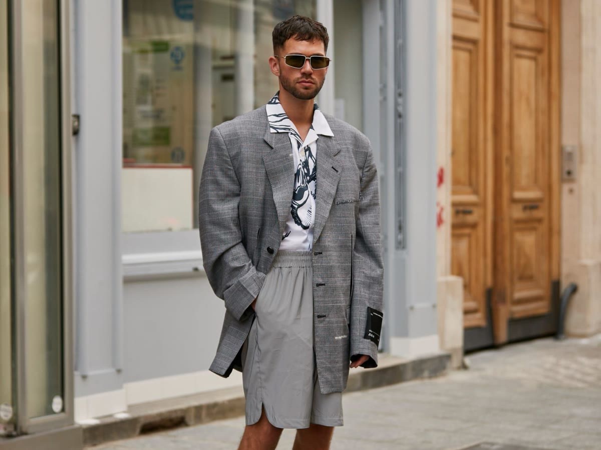Athletic menswear outfit with structured tailoring and shorts